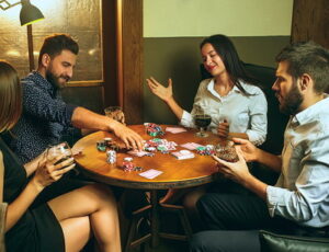 friends player poker in a pub