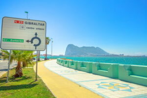 gibraltar sign with rock in background