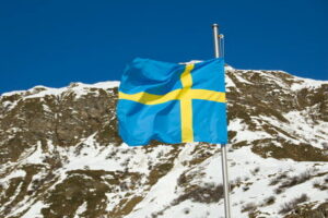 sweden flag mountain background