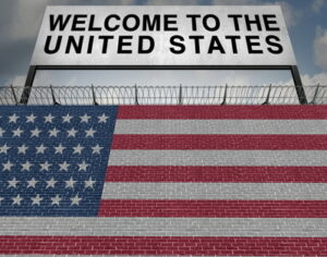 united states flag and welcome sign