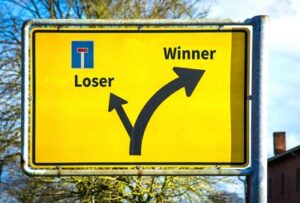 winner loser street sign