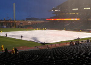 baseball park with infield covers to protect against rain