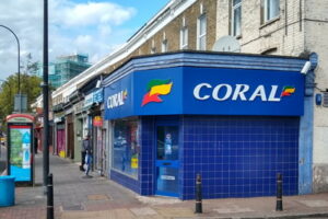 older style coral shop with blue tiled exterior