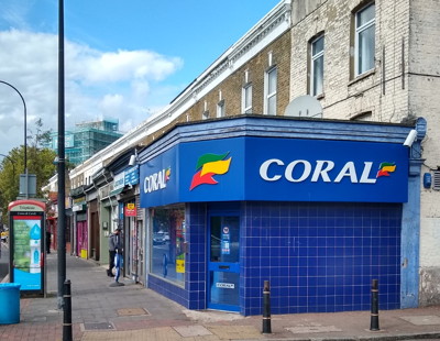 older style coral shop with blue tiled exterior