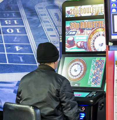 fixed odds betting terminal being played in a betting shop