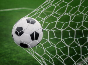 ball in back of football net